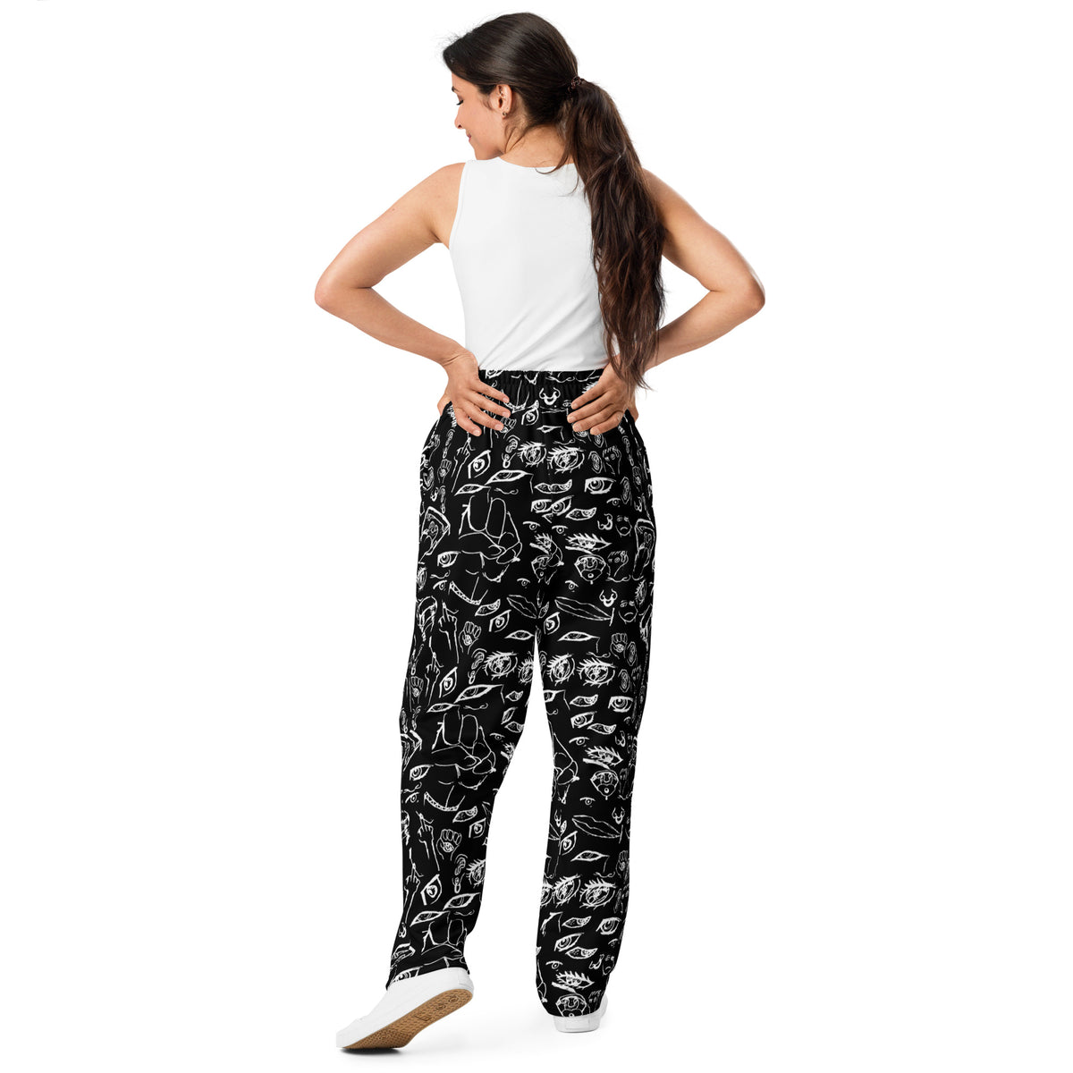 Model wearing the Doodle wide-leg joggers in White on Black, back view
