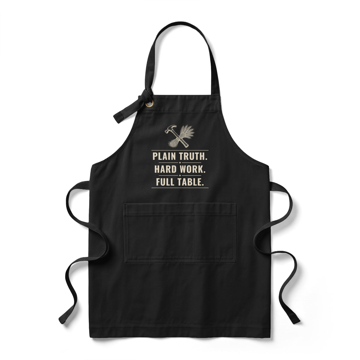 Plain Truth. Hard Work. Full Table. heavy twill apron in deep black, hammer-and-wheat crest