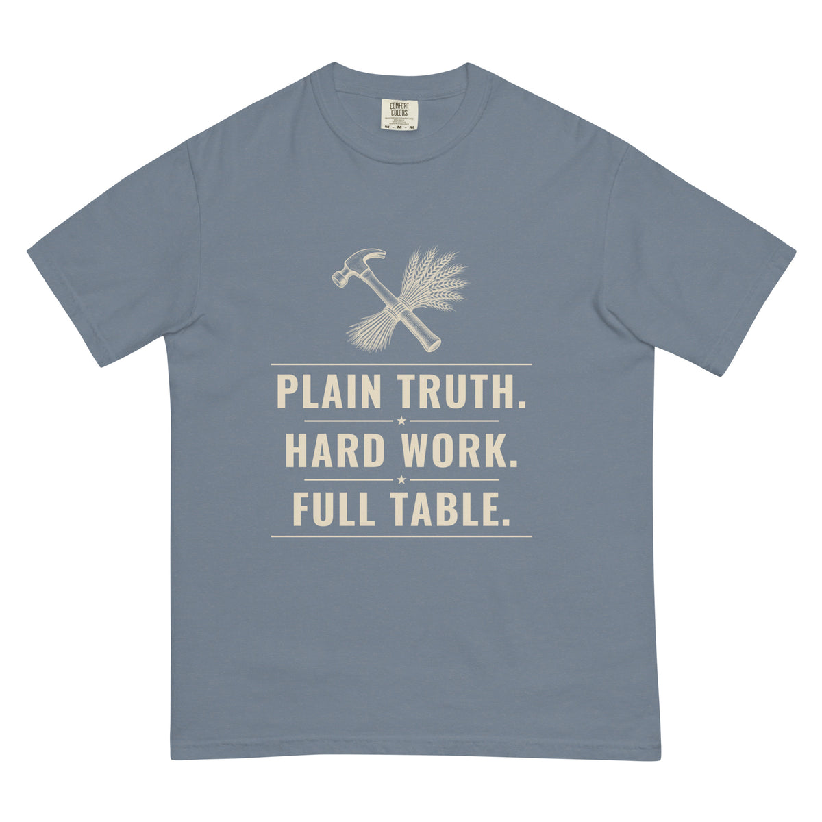 Plain Truth heavyweight tee in Blue Jean, front: PLAIN TRUTH. HARD WORK. FULL TABLE. hammer-and-wheat crest
