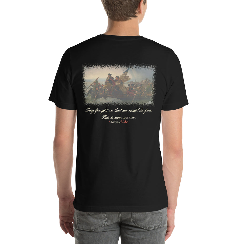 Back of the black Believe in U.S. tee on a model: Washington Crossing the Delaware print above the line They fought so that we could be free. This is who we are.