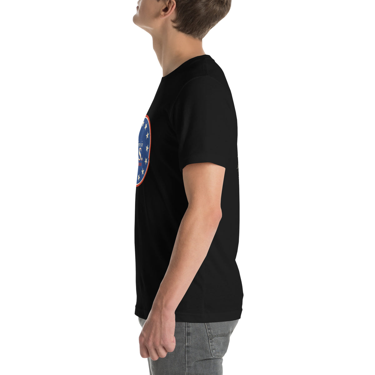 Left side view of the black Believe in U.S. tee
